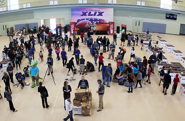 Hundreds of students and adult coordinators in the greater Phoenix area swarmed the Salvation Army South Mountain Kroc Community Center to donate more than 33,000 items to children in need. Photo by Miranda Perez