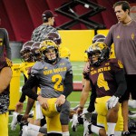 ASU quarterback Mike Bercovici (2) stretches before practice inside the Verde Dickey Dome in Tempe on Tuesday. (Cronkite News photo by Bill Slane)