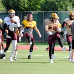 Sun Devils, including safety Jordan Simone (42) stretch before practice in Tempe on September 8, 2015. (Cronkite News photo by Bill Slane)