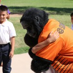 The Phoenix Suns Gorilla gives hug to student at Loma Linda Elementary. (Cronkite News photo by Kevin Jimenez)