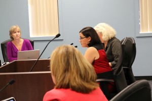 Christine Thompson, center, executive director of the State Board of Education, addresses a special meeting of the board on Tuesday.