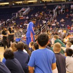 Anthony Blakes of the Harlem Globetrotters talks with kids from local schools about what the Globetrotters call “The ABCs of Bullying Prevention.” (Cronkite News photo by Kris Vossmer)