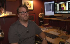 William Scot Grey, founder of Bloodhound, sits behind his desk at his Phoenix home. Bloodhound helps track those with dementia who wander off. It is one of the five finalists in the Phoenix Smart City App Hack competion. 