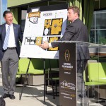 Arizona Organizing Committee co-chair Brad Wright and Phoenix Mayor Greg Stanton unveil the map of Championship Campus that will be in downtown Phoenix from Jan. 8-10 for the College Football Playoff National Championship Game. (Cronkite News photo by Evan Webeck)