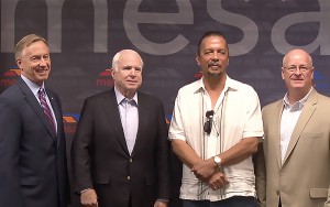 Marine Corps veteran (second from right) received keys to an apartment Wednesday, Sept. 2, 2015, through a Mesa program aimed at reducing homelessness among veterans. He is joined by (from left) Mesa Mayor John Giles, U.S. Sen. John McCain and Councilman Chris Glover.