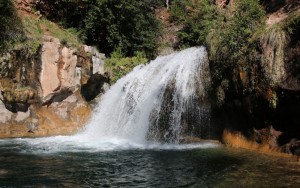 Fossil Creek’s water falls and swimming holes have drawn nearly 100,000 visitors so far in 2015.