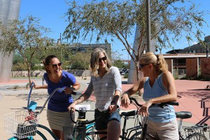 Colorado resident Stephanie Heitz, middle, stops during a bike ride in Phoenix with friends Lana Frey, right and Kym Sager. (Photo by Lindsey Nelson/Cronkite News)