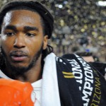 Alabama junior linebacker Tim Williams carries the championship t-shirt on his shoulder as the confetti fell on the field of University of Phoenix Stadium after the Crimson Tide defeated the Clemson Tiger 45-40 to win the College Football National Championship. (Photo by Bill Slane/Cronkite News)