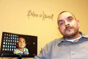 Rick Reyes, shown in his office, is the lead behavioral health technician at Recovery Oasis in Tempe. (Photo by Claire Cleveland/Cronkite News)