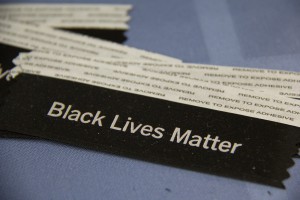 Ribbons with the Black Lives Matter message are given to attendees at the Valley Unitarian Universalist Church in Chandler. (Photo by Becca Smouse/Cronkite News)