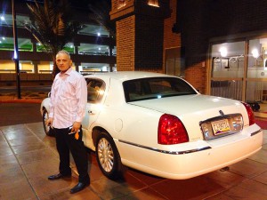 Taxi driver Sunny Rruka has been his own boss for more than 10 years. After purchasing a car and commercial insurance, he’s driven thousands of miles transporting tourists and locals around the Phoenix metro area. (Photo by Amy Edelen/Cronkite News)