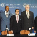 College Football Playoff Executive Director Bill Hancock, 2016 Hall of Fame electee Randall Cunningham, ESPN's Joe Tessitore, 2016 Hall of Fame electee Pat McInally and National Football Foundation President and CEO Stave Hatchell (left to right) pose for media after the 2016 College Football Hall of Class was announced at the JW Marriott Scottsdale Camelback Inn in Scottsdale. (Photo by Bill Slane/Cronkite News)