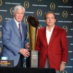 Alabama head coach Nick Saban and athletic director Bill Battle pose with the College Football Playoff National Championship trophy the day after the Crimson TIde team defeated Clemson 45-40. (Photo by Bill Slane/Cronkite News)