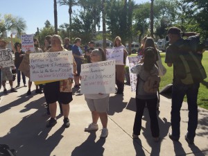 Protesters call for a re-vote before a legislative hearing Monday on Maricopa County’s election day disaster. (Mallory Price/Cronkite New)