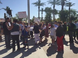 Protesters call for a re-vote before a legislative hearing Monday on Maricopa County’s election day disaster. (Mallory Price/Cronkite New)