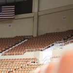 The American flag hangs in the rafters of the Arizona Veterans Memorial Coliseum. (Photo by Jake Gadon/Cronkite News)
