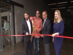 (From left to right) U.S Rep. Ruben Gallego, D-Ariz., The Vintage 45 Excutive Director Eneyas Freitas, Maricopa Country Supervisor Steve Gallardo and Phoenix Vice Mayor Kate Gallego prepare to cut the ribbon. (Photo by Gilbert Cordova/Cronkite News)