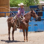 Otoniel Vargas, 15, practices rope manuvers while on his horse at Rancho Ochoa in Phoenix on April 17, 2016. (Photo by Karla Aguilar/Cronkite News)