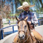 Ernesto Osornio rides along the arena at Rancho Ochoa in Phoenix on April 17, 2016. (Photo by Karla Aguilar/Cronkite News)