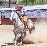 Otoniel Vargas, 15, training with his horse at Rancho Ochoa in Phoenix on April 17, 2016. (Photo by Karla Aguilar/Cronkite News)