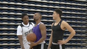 Phoenix Suns guards Brandon Knight, Ronnie Price and Devin Booker (left to right) running drills during practice. (Photo by Johnny Soto/ Cronkite News)