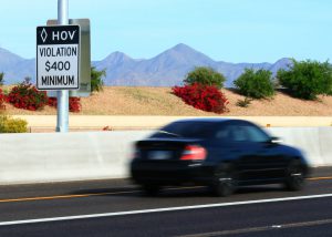 The state recently began installing more than 250 signs that say “HOV Violation $400 Minimum” along Valley freeways with HOV lanes. (Photo courtesy Arizona Department of Transportation)