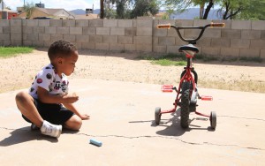 Asthmatic children can experience trouble breathing while playing outside, but especially if there is high levels of particulate matter in the air. (Photo by Alejandra Armstrong/Cronkite News).