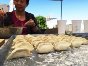 Dumplings have a long history in China. Chinese-Americans in the Phoenix area make dumplings together as friends and family. (Photo by Jiahui Jia/Cronkite News)