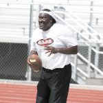 ASU Prep coach Byron Evans coaches at former Eagles cornerback Mark Mc Millan’s football camp, Camp 29. Evans played for Buddy Ryan, who passed away Tuesday at the age of 85. (Photo by John Alvarado/Cronkite News)