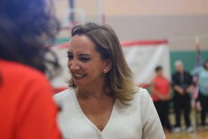 Claudia Ruiz Massieu, Secretary of Foreign Affairs for Mexico, greets crowd members in Phoenix at “Construye En Tu Tierra”, a new housing initiative between Sonora and Arizona. (Photo by Socorro Carrillo/Cronkite News)
