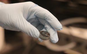 Researchers coated a piece of one of the meteorites in epoxy and prepped it for geochemical analysis. (Photo by Anna Copper/Cronkite News)