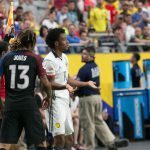 U.S. midfielder Jermaine Jones and Colombia’s Juan Cuadrado look on after battling for the ball along the sideline. (Photo by: Joseph Steen/Cronkite News)