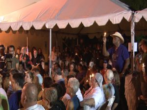 The crowd at the vigil in downtown Phoenix lit candles to show solidarity in light of the Orlando tragedy. (photo by Eddie Keller/Cronkite News)