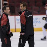 Coyotes Director of Player Development Steve Sullivan and associate coach Jim Playfair lead practice at the Coyotes development camp at Gila River Arena. (photo by John Alvarado/Cronkite News)