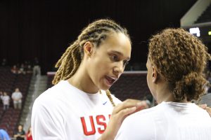 U.S. women’s basketball team member Brittney Griner talks to teammate Tamika Catchings during practice in Los Angeles. (Photo by Ryan Wright/Cronkite News)