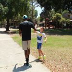 Blair-Sanford hangs out with local kids within the community. He said he is “slightly” considered a celebrity to people in the kibbutz. (Photo by Logan Newman/Cronkite News)