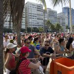 Crowds of people wait in line at Copacabana Beach to buy tickets to the beach volleyball arena on Aug. 6, 2016 in Rio de Janeiro, Brazil. (Photo by Jaclyn Chung/Cronkite News)