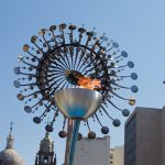 The Olympic Cauldron glows in the sunlight during the Olympics. (Photo by Scotty Bara / Cronkite News)