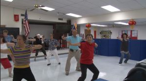 Members of the Chinese Senior Center participate in line dancing, one of the activities provided at the Phoenix center. (Photo by Katelyn Greno/Cronkite News)