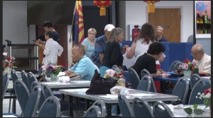 Members of the Chinese Senior Center spend time talking and taking classes at the Phoenix center. (Photo by Katelyn Greno/Cronkite News)