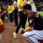 Diamondbacks first baseman Paul Goldschmidt greets patients on the field at the D-backs Go Gold for Childhood Cancer Awareness Game. (Photo by Giselle Cancio/Cronkite News)