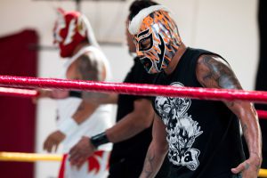 Psycho wears a colorful mask in the ring. (Photo by Kelsey DeGideo/Cronkite News)