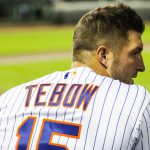 Scottsdale Scorpions outfielder Tim Tebow watches from the dugout during the team’s matchup against the Surprise Saguaros, Wednesday, Oct. 19 in Scottsdale. (Photo by Nicole Vasquez/Cronkite News)