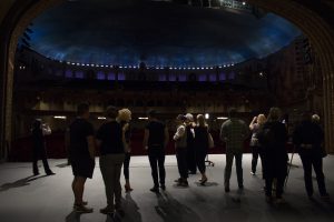 A group tours the Orpheum Theatre and learns about the people and ghosts that flavor the building’s 87-year history. (Photo by Ally Carr/Cronkite News)