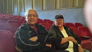 Peterson Zah, the first president of the Navajo Nation, sits with his wife, Rosalind Zah, as they prepare to listen to Bernie Sanders speak in Flagstaff. (Photo by Peter Chen/Cronkite News)