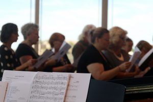 Choir members sing during a Sunday service at Shadow Rock United Church of Christ in north Phoenix.  (Photo by Courtney Columbus/Cronkite News)