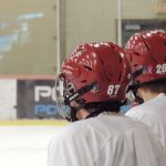 Players on the under-18 Jr. Coyotes watch their teammates run drills during practice at the Ice Den in Scottsdale, Arizona on Oct. 13, 2016. (Photo by Matt Layman/Cronkite News)