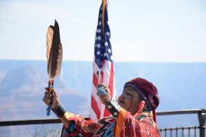 A  member of the Havasupai Tribe performs a traditional ritual during a naturalization ceremony in August at Grand Canyon National Park. (Photo by Bri Cossavella/Cronkite News)