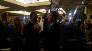 Phoenix Mayor Greg Stanton celebrates with Paul Penzone after Penzone’s victory in the race for Maricopa County sheriff. (Photo by Sean Pepper/Cronkite News)