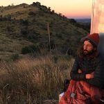 After finishing his 800-mile run of the Arizona Trail, all Michael Versteeg wanted to do was sit at the border and watch the sun rise. (Photo courtesy of Michael Versteeg)